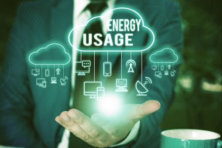 Writing note showing Energy Usage. Business concept for Amount of energy consumed or used in a process or system Male wear formal work suit presenting presentation smart device